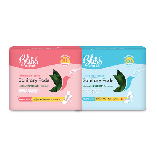 Two packages of Bliss natural sanitary pads.