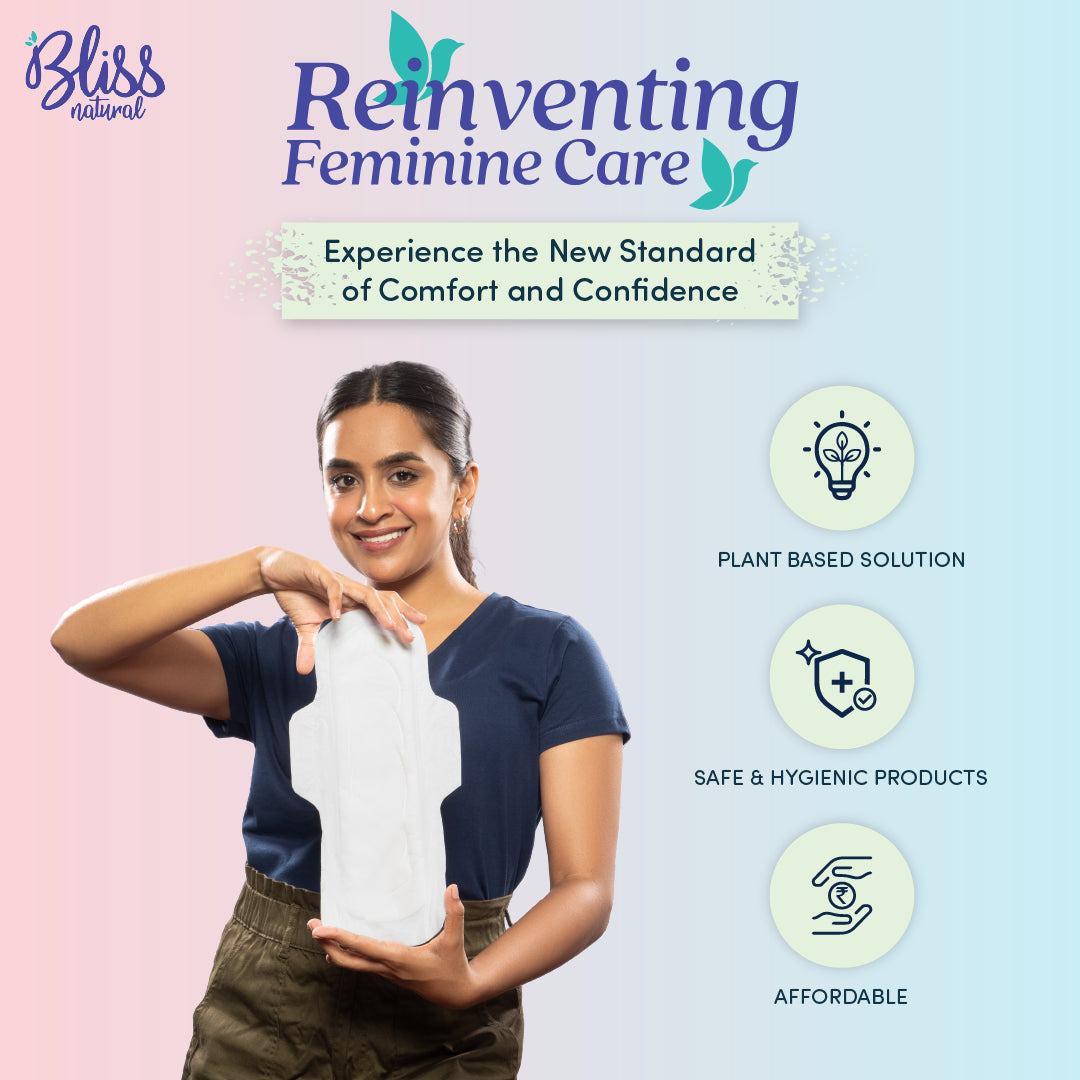 Two packages of Bliss natural sanitary pads.