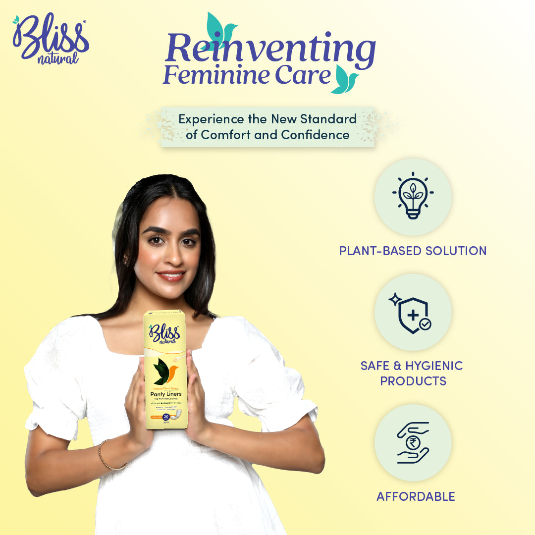 Woman holding Bliss Natural panty liners pack for everyday freshness and protection from discharge